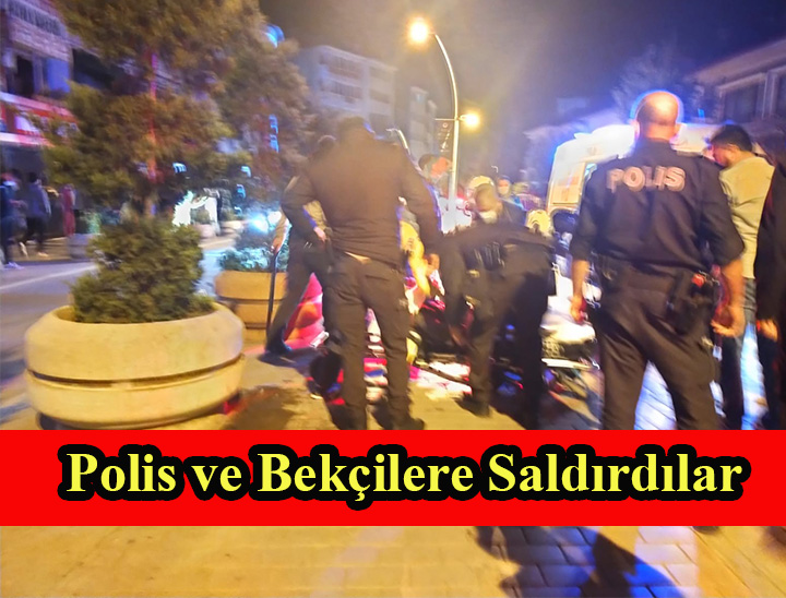 Kavga eden 2 grup , polis ve bekçilere saldırdı