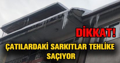 ÇATILARDAN SARKAN BUZLAR TEHLİKE SAÇIYOR