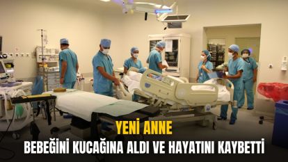 BEBEĞİNİ KUCAĞINA ALDI VE HAYATINI KAYBETTİ