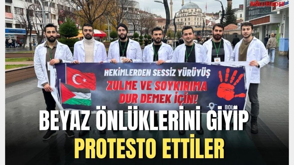 BEYAZ ÖNLÜKLERİNİ GİYİP HASTANELERİN BOMBALANMASINI PROTESTO ETTİLER