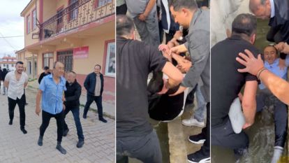 Bayram geleneği olarak köyde bulunan su oluğuna atılıyor